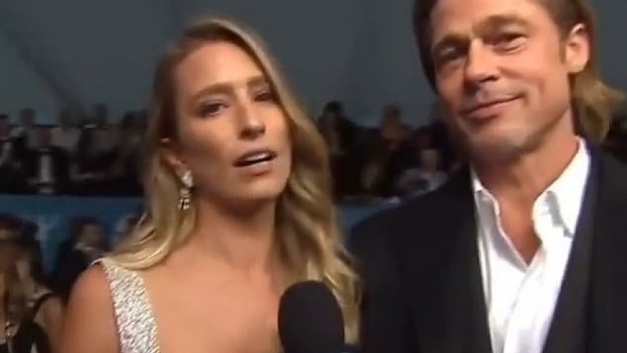 Tài tử Brad Pitt hẹn hò nữ phóng viên xinh đẹp người Australia?