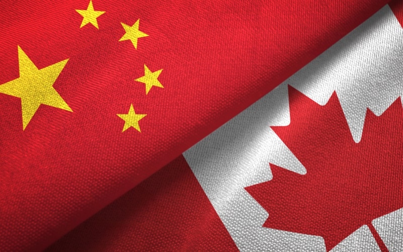 Hình quốc kỳ Trung Quốc và Canada. Ảnh: Apfc.
