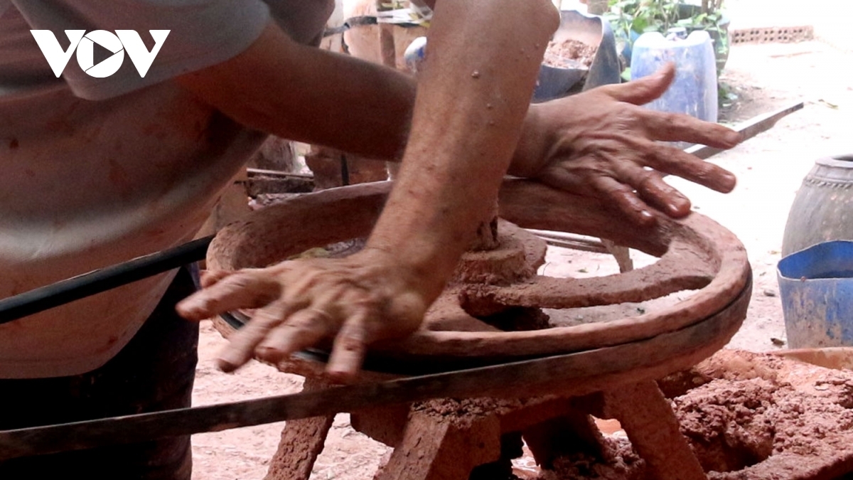 The first step in making the items is to mix clay.