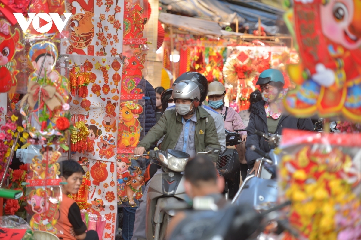 Back to Hang Ma street, which is famous for decorations during special occasions of the year, visitors get lost in a world of Tet decoration.