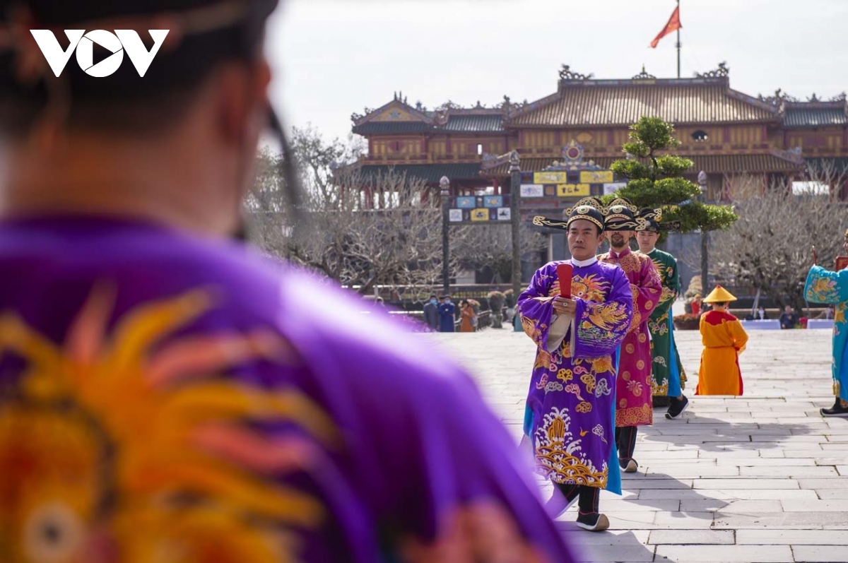 The Princes bow to the king ahead of the official ritual.