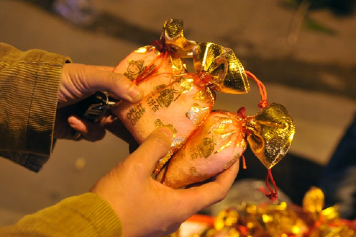 Salt is wrapped in small bags and sold to people on Lunar New Year's Day