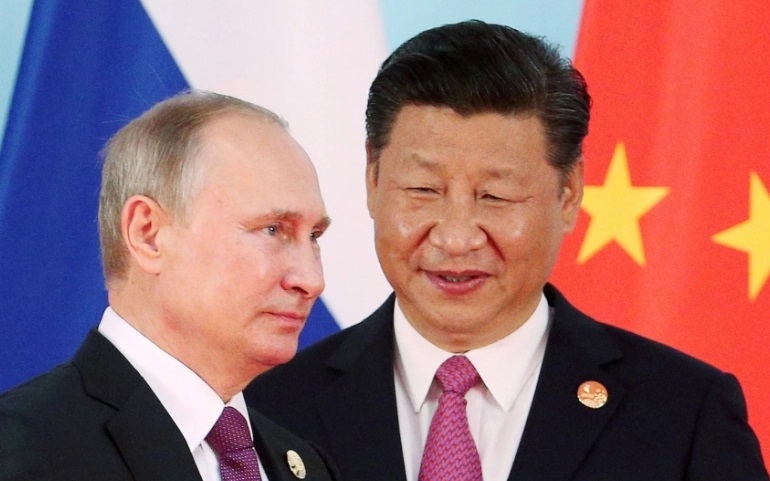 Tổng thống Nga Vladimir Putin và Chủ tịch Trung Quốc Tập Cận Bình. Ảnh: al Jazeera.