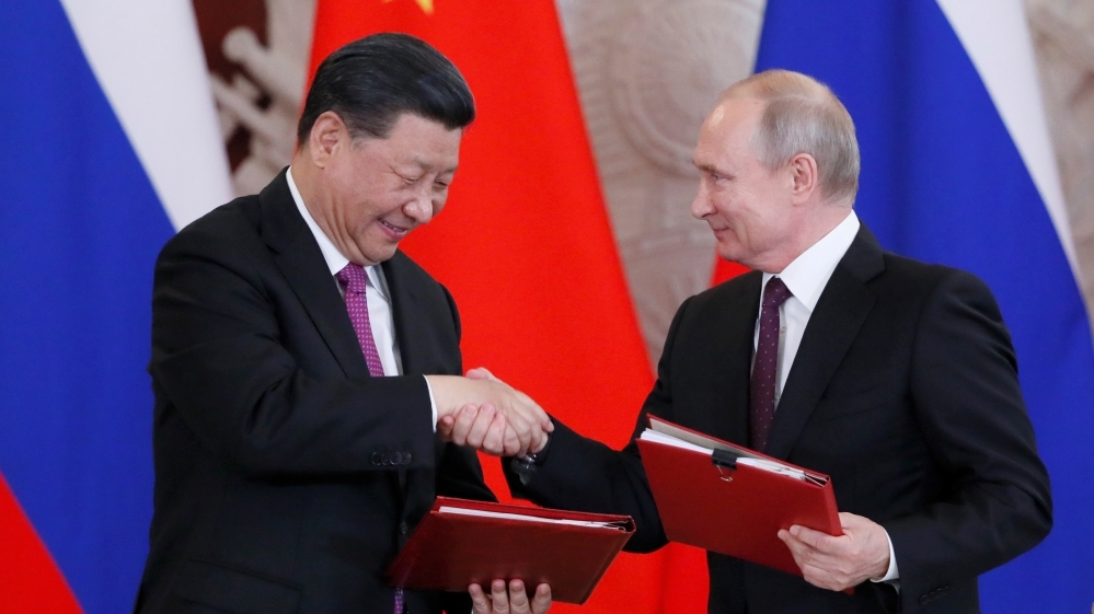 Chủ tịch Trung Quốc Tập Cận Bình (trái) và Tổng thống Nga Vladimir Putin. Ảnh: Reuters