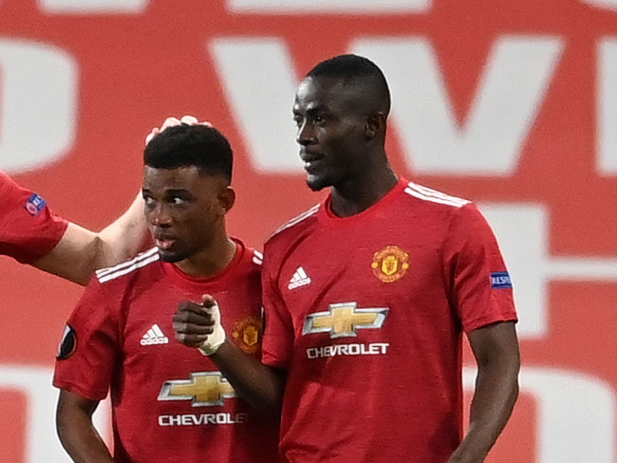 Eric Bailly và Amad Diallo trong màu áo MU. (Ảnh: Getty).