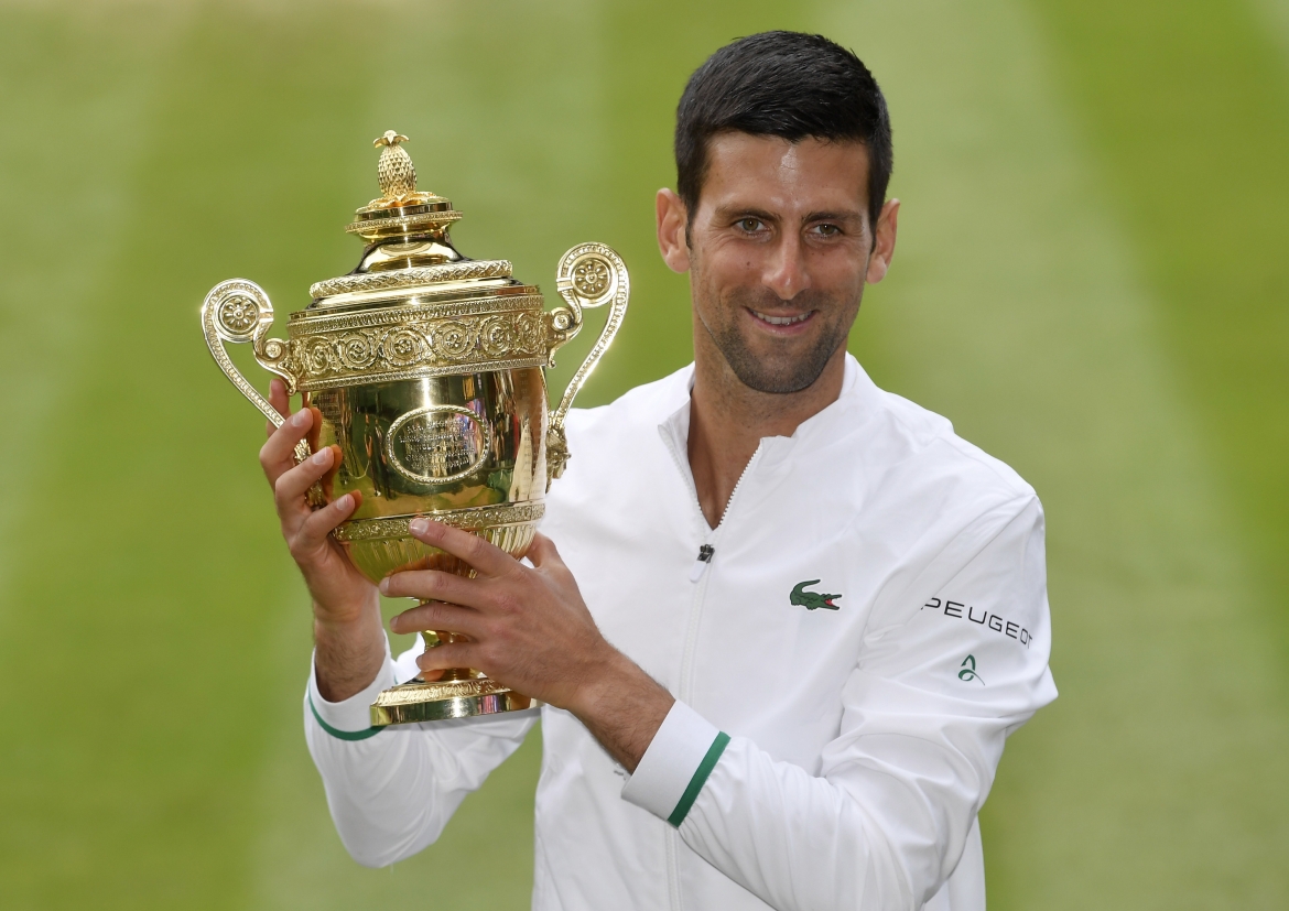 Nole đã có số danh hiệu Grand Slam tương đương Federer và Nadal. (Ảnh: Reuters). 