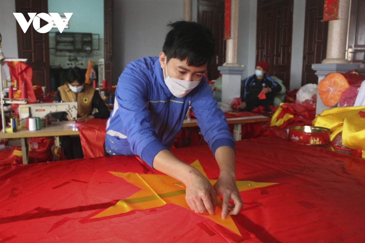 Nguyen Van Phuc’s family is among those in Tu Van village that typically makes most flags each year.