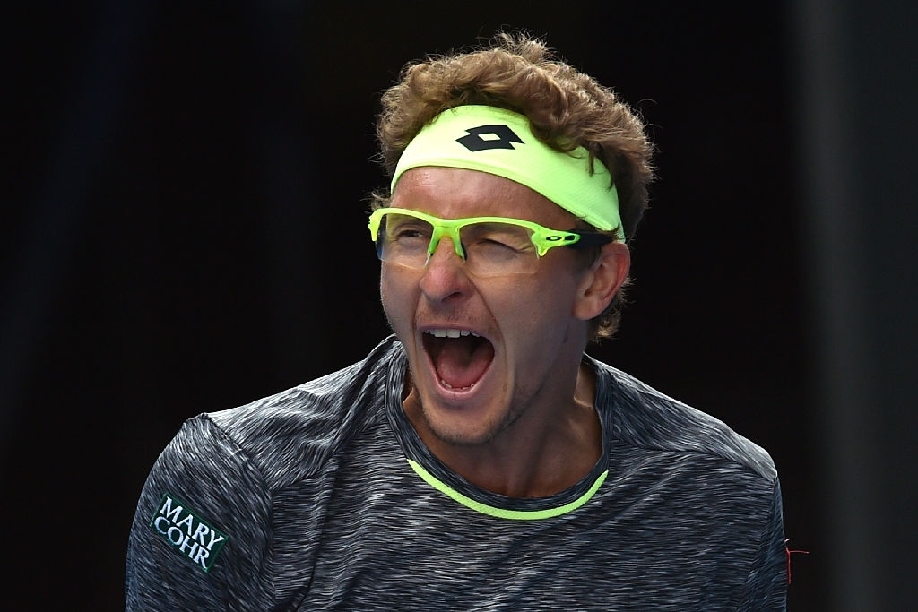 Istomin ăn mừng chiến thắng trước Djokovic. (Ảnh: Getty). 