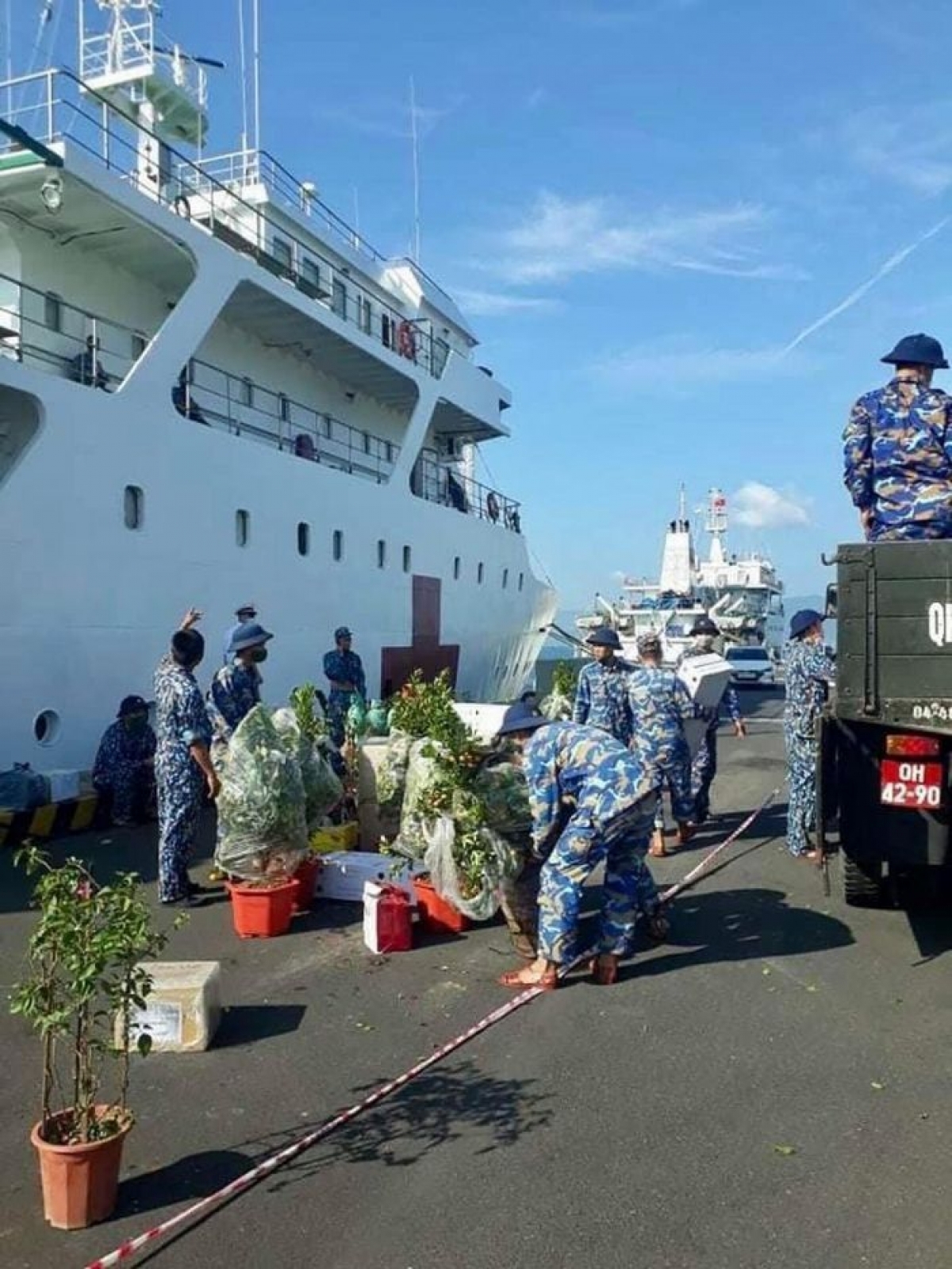 Soldiers of brigade 955 bring a variety of gifts and necessities aboard.