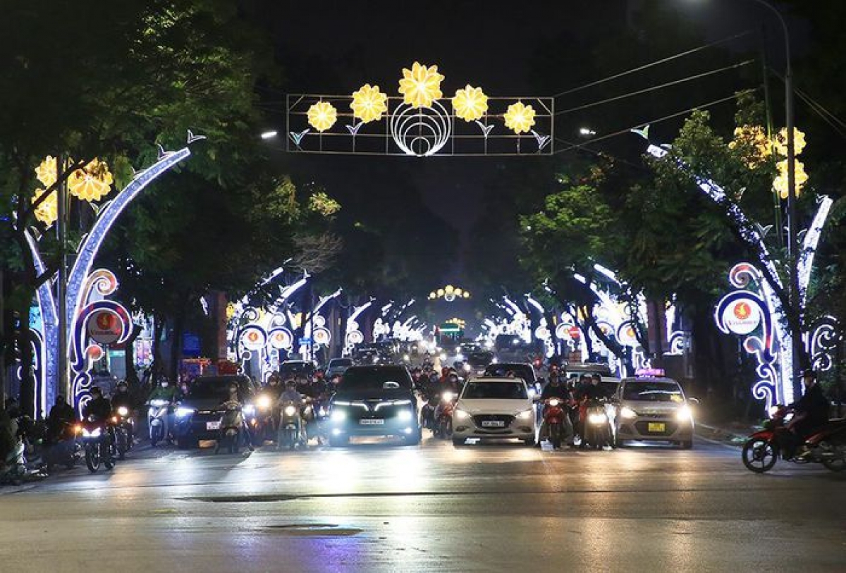 The streets around the centre of Hanoi are left shimmering and colourful by an array of decorative street lights.