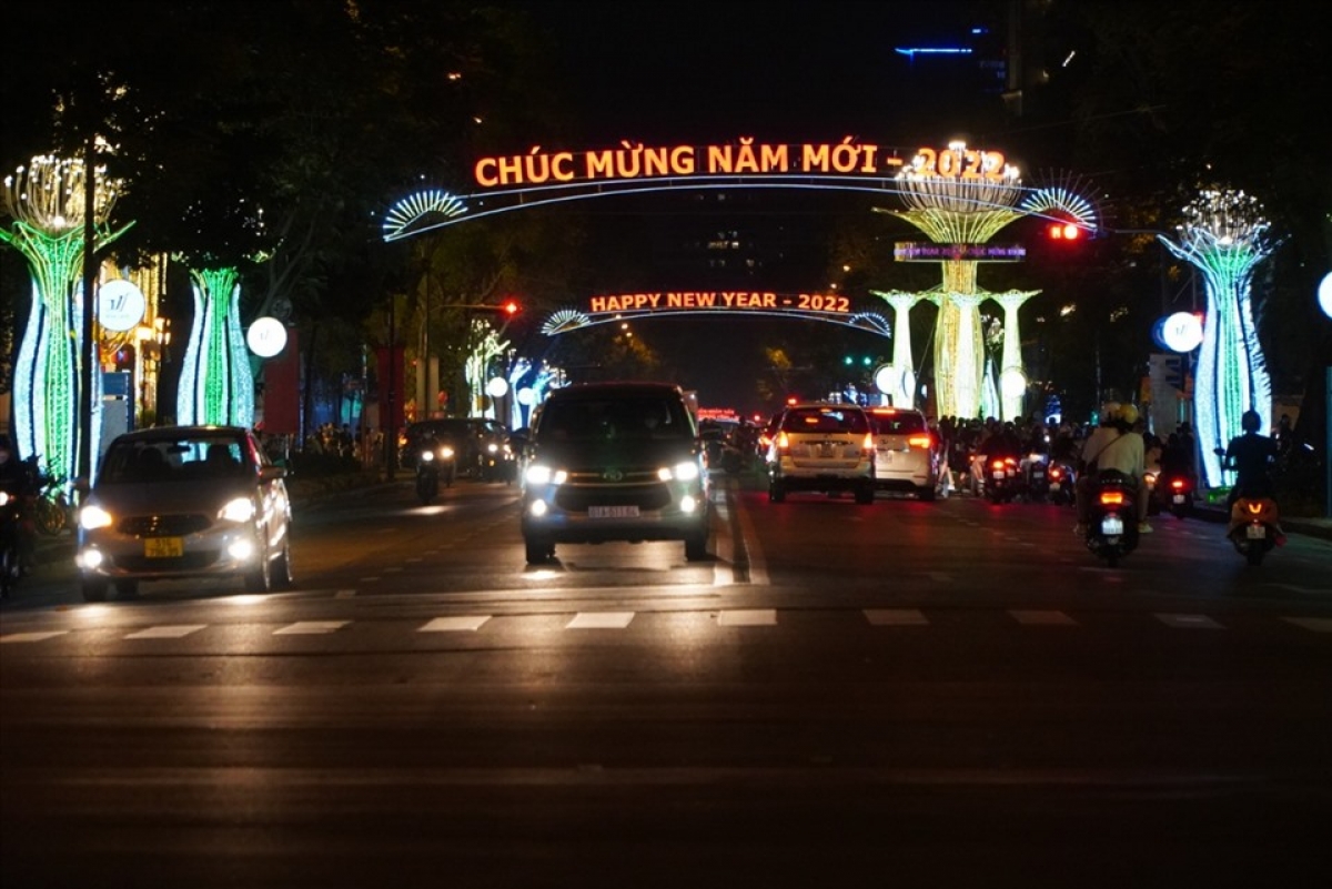 Banners featuring wishes of Happy New Year in both English and Vietnamese are hung up on many streets throughout the city.