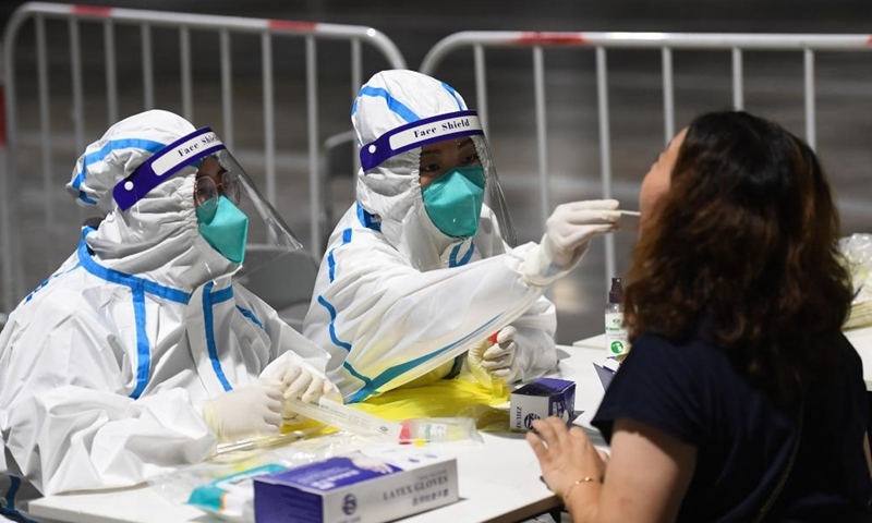 Việc phát hiện các ca Covid-19 thường kích hoạt việc xét nghiệm axit nucleic diện rộng ở Trung Quốc. Ảnh: Tân Hoa xã.