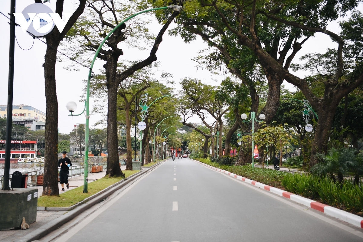 Thanh Nien street, normally a busy road, falls quiet.