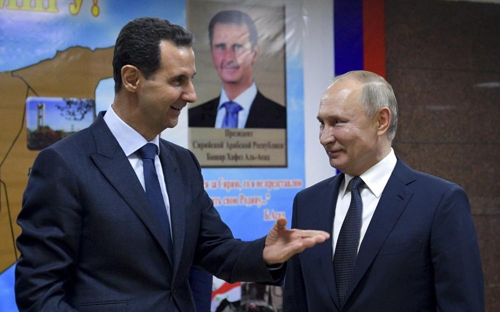 Tổng thống Nga Putin (phải) và Tổng thống Syria Assad. Ảnh: Sputnik.