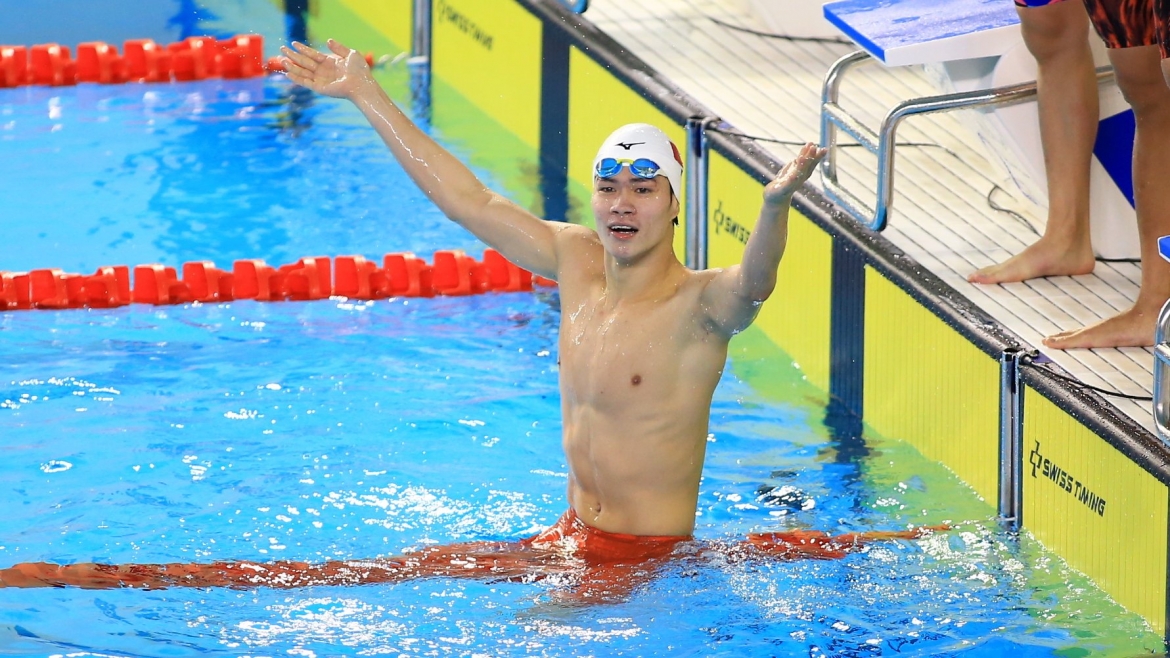 Hưng Nguyên ăn mừng ở nội dung 4x200m tự do nam khi là VĐV bơi cuối cùng. 