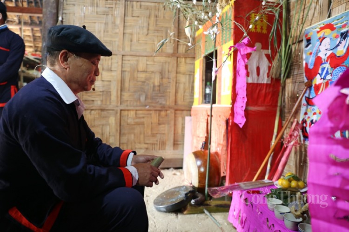 A man conducts the ancestor worshiping ritual to banish evil omens from a family.