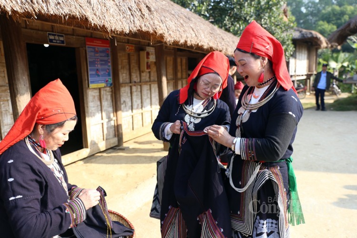 Local women begin to sew clothes for their families for the new year celebrations.