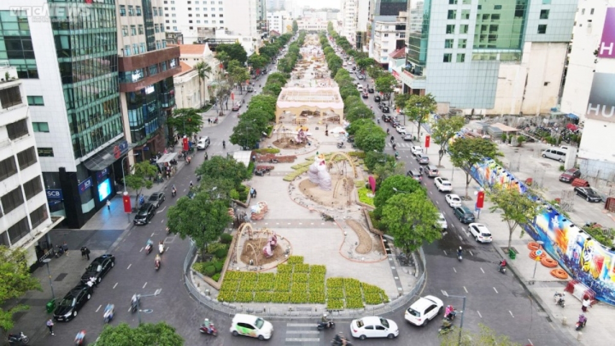 Nguyen Hue walking street is nearly ready after over two weeks of hard work for the festive celebrations. This year the flower street is scheduled to open to the public from 7 p.m. on January 19, two days before the Lunar New Year's Eve, and close on January 26, the fifth day of the first lunar month.