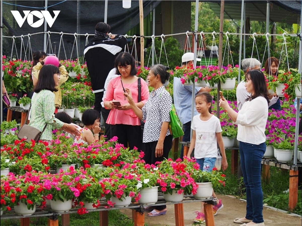 The village becomes a tourist hotspot each year with about one million visitors before and during Tet.