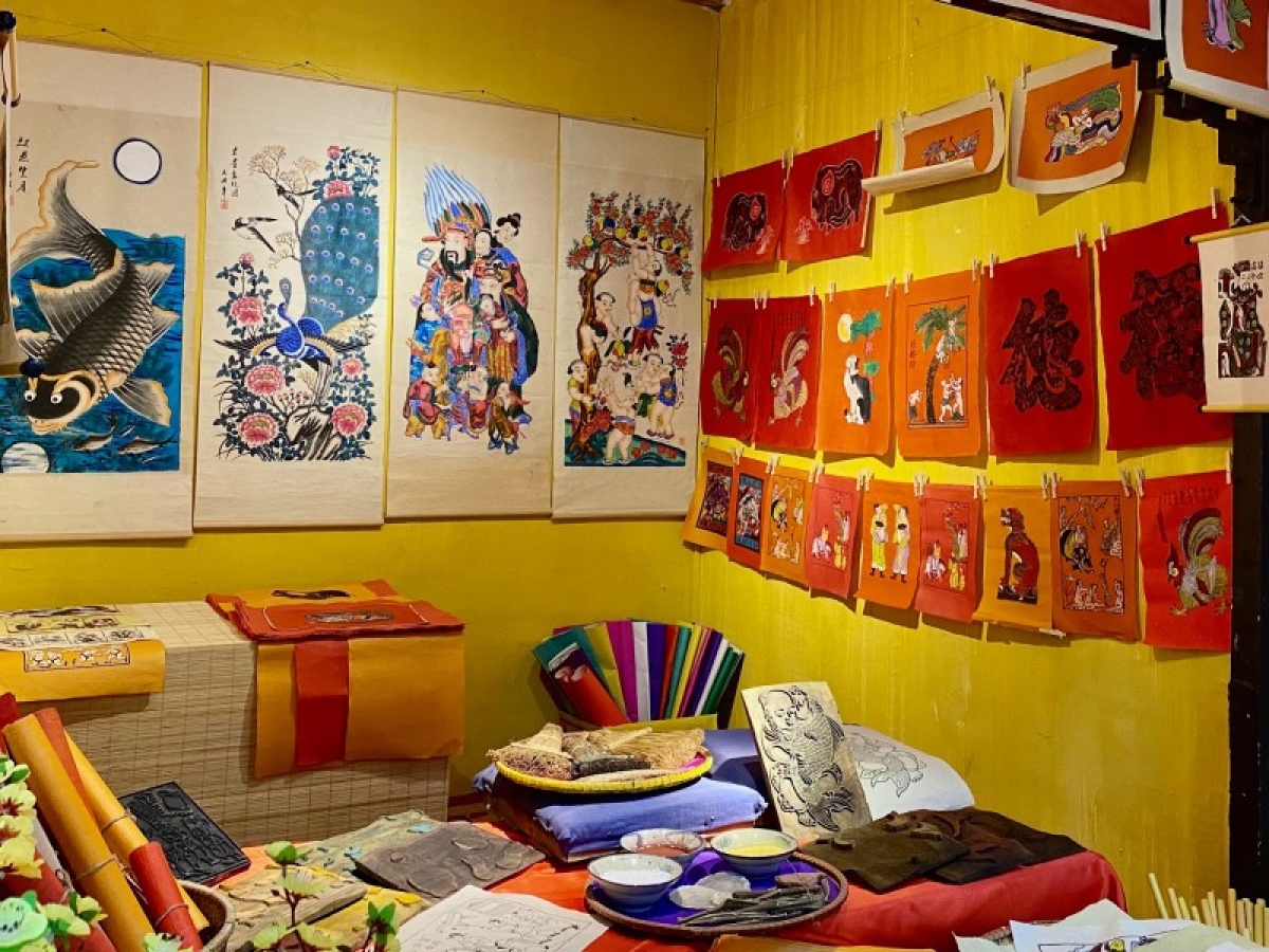 Folk painting genres from across the country, including Hang Trong and Kim Hoang in Hanoi, as well as Dong Ho which originates from the northern province of Bac Ninh, are used to decorate houses during Tet, sending wishes of peace, luck, and prosperity in the new year.