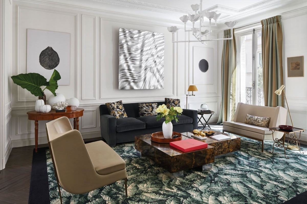 Nếu bạn muốn tạo điểm nhấn cho căn phòng thêm thú vị, đừng ngần ngại đặt một tấm thảm mang đậm phong cách nhiệt đới ở giữa phòng. Ảnh minh họa