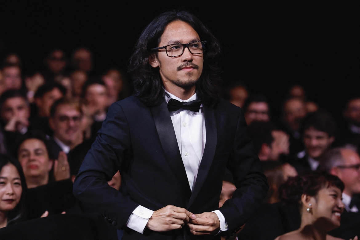 Đạo diễn Phạm Thiên Ân tại sân khấu Cannes 2023.