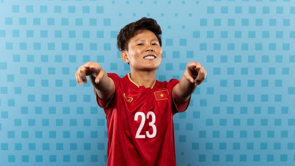 Bích Thùy, cầu thủ ghi bàn quyết định đưa ĐT nữ Việt Nam đến với World Cup, ăn mừng rất ''nhiệt''. 