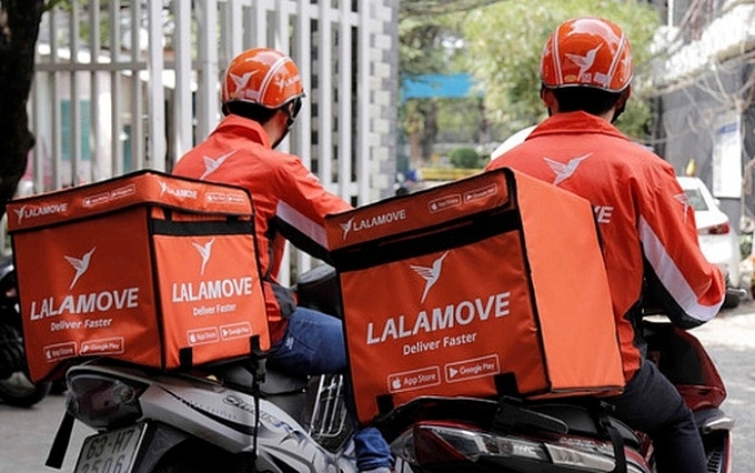 Cách đây mấy hôm, con trai tôi đem về nhà trang phục của hãng xe công nghệ, nói là sẽ bỏ học đi làm shipper (ảnh minh họa)