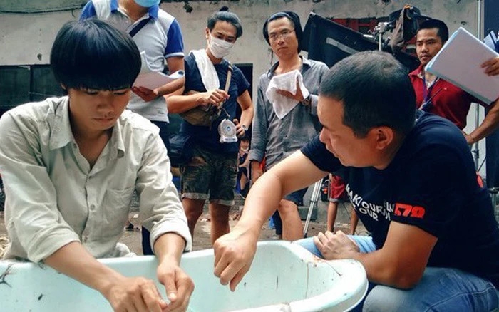 Đạo diễn Lương Đình Dũng và nam chính Quốc Toàn.