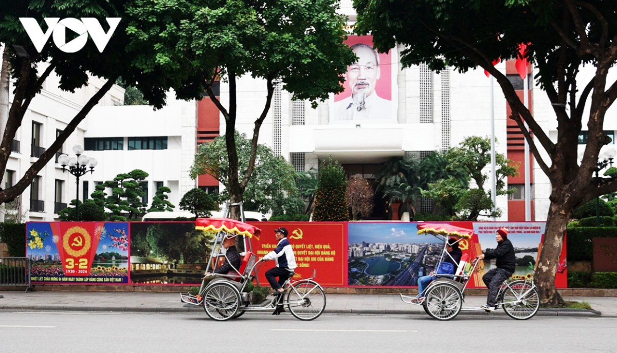 A large banner erected at the headquarters of the Hanoi Party Committee reads “Celebrating 94 Years of the Communist Party of Vietnam”