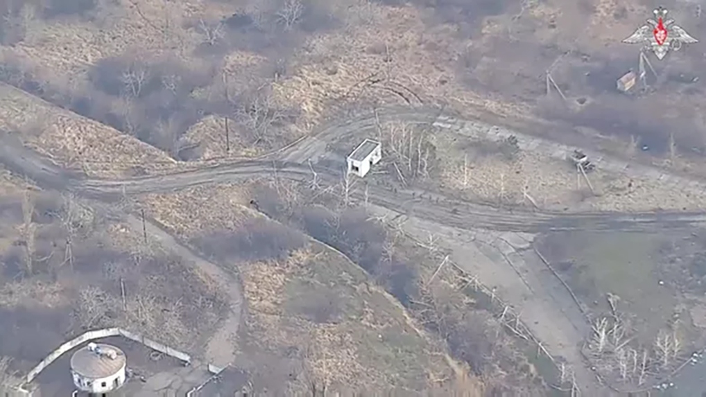 Hình ảnh quân Ukraine rút khỏi thành phố chiến lược Avdiivka. (Ảnh: Sputnik)