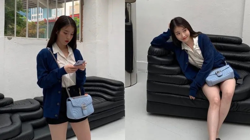 Gucci GG Marmont là một chiếc túi "linh hoạt" khi có thể dễ dàng kết hợp với nhiều kiểu trang phục cũng như phong cách khác nhau. Mẫu túi này có thể đeo chéo, đeo một bên hoặc sử dụng như một chiếc clutch. Gucci GG Marmont có 19 màu, phù hợp với sở thích của nhiều người. IU đã lựa chọn màu xanh pastel nhẹ nhàng, kết hợp với trang phục đơn giản, nhưng vẫn toát lên vẻ tiểu thư. Các tín đồ thời trang gợi ý rằng, nếu muốn sở hữu chiếc túi hiệu đầu tiên, GG Marmont Matelassé là sự lựa chọn phù hợp. Chiếc túi này có giá khoảng 2.590 USD.