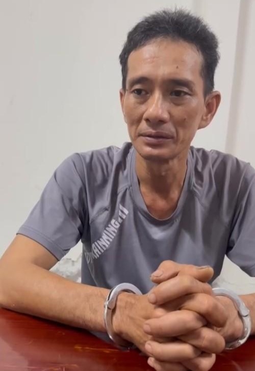 Đỗ Thái Em tại cơ quan công an.