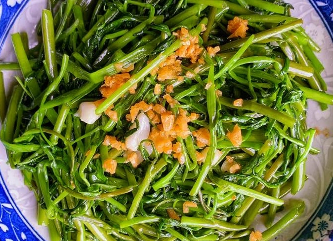 Rau muống xào tỏi là món ăn truyền thống của Việt Nam (ảnh: Sức khỏe đời sống)