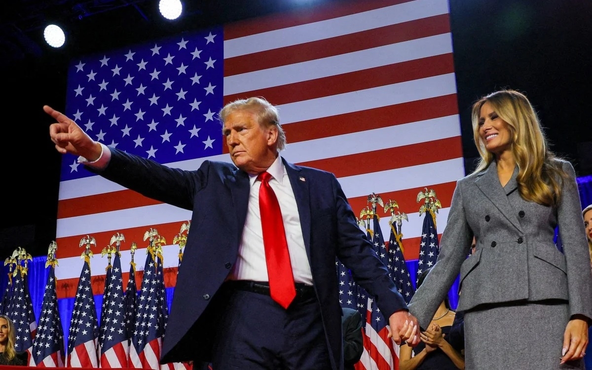 Tổng thống đắc cử Mỹ Trump và phu nhân Melania vào tháng 11/2024. Ảnh: Reuters.