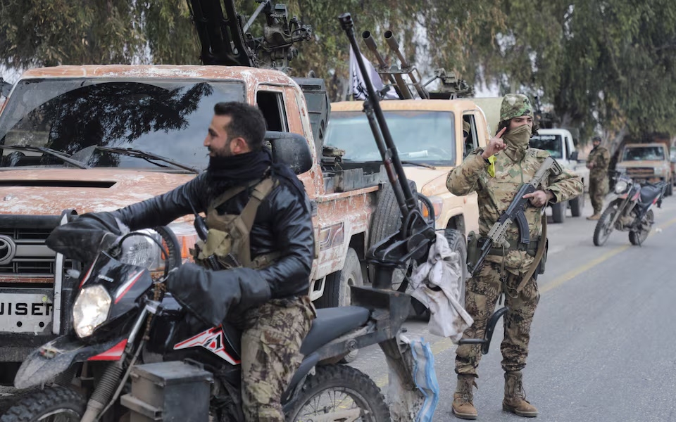 Phiến quân Syria tại Homs. Ảnh: Reuters.