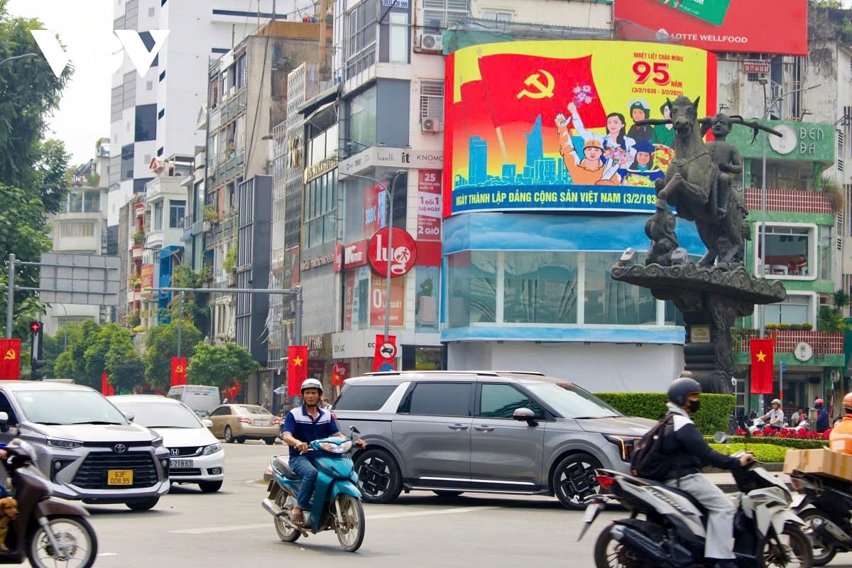 The city is transformed with colorful flags, flowers, and banners, creating a festive atmosphere that signals the arrival of the new year.