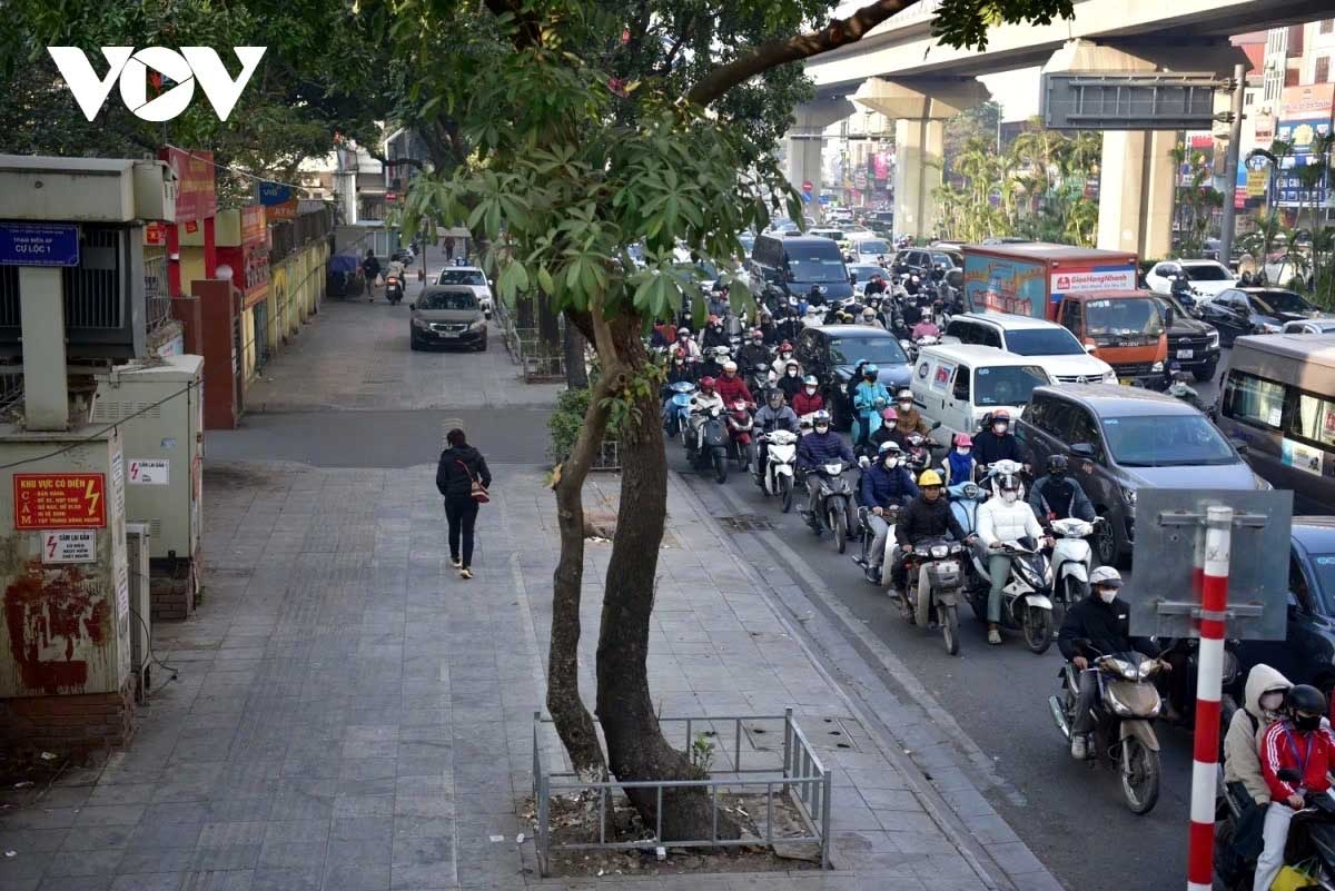 Despite the severe traffic jams, Hanoi's streets no longer see motorbike riders mounting pavements, thanks to the enforcement of the Government’s Decree 168 that imposes heavy fines on traffic law breakers