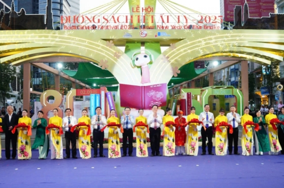 Delegates cut the ribbon to open the event