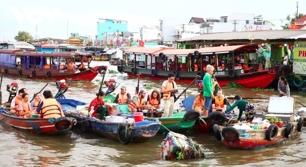 The floating market is a lively hub filled with boats selling a diverse range of local products.