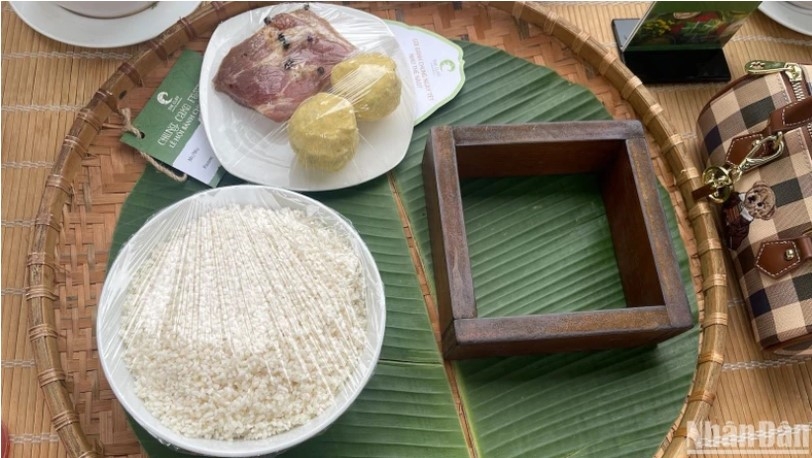 The annual contest aims to honour the traditional values of Vietnamese cuisine through making the square glutinous cake and enjoying local Tet dishes.