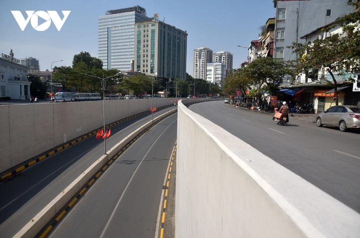 The area around the Kim Lien underpass is empty of traffic.