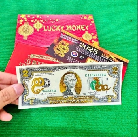 The snake image on the US$2 note plated with 24K gold is among the most favourite items this year.