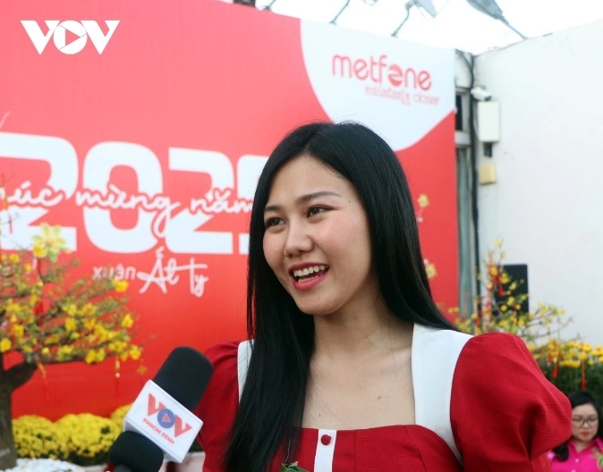 Srey Mey, a long-time Metfone employee expresses her excitement for the event