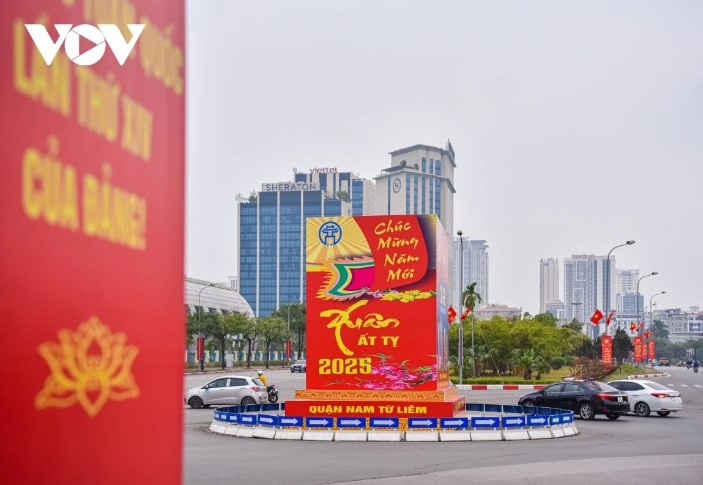 Large posters are displayed along Hanoi's main streets to celebrate the Lunar Year of the Snake.