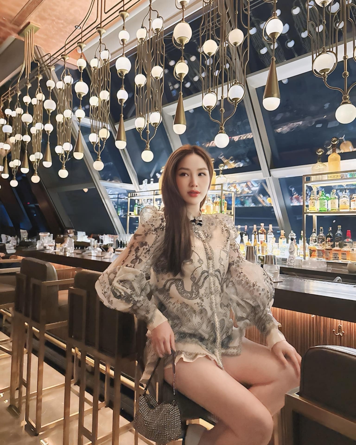 Bảo Thy đón năm mới với chuyến nghỉ dưỡng ở Thái Lan. Nữ ca sĩ cho biết cô tranh thủ đi chơi, chụp hình sau khi ru các con ngủ. (Nguồn: FBNV)