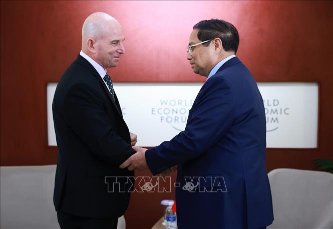 Thủ tướng Phạm Minh Chính tiếp ông Dave West, Chủ tịch Tập đoàn Cisco. (Ảnh: Dương Giang/TTXVN)