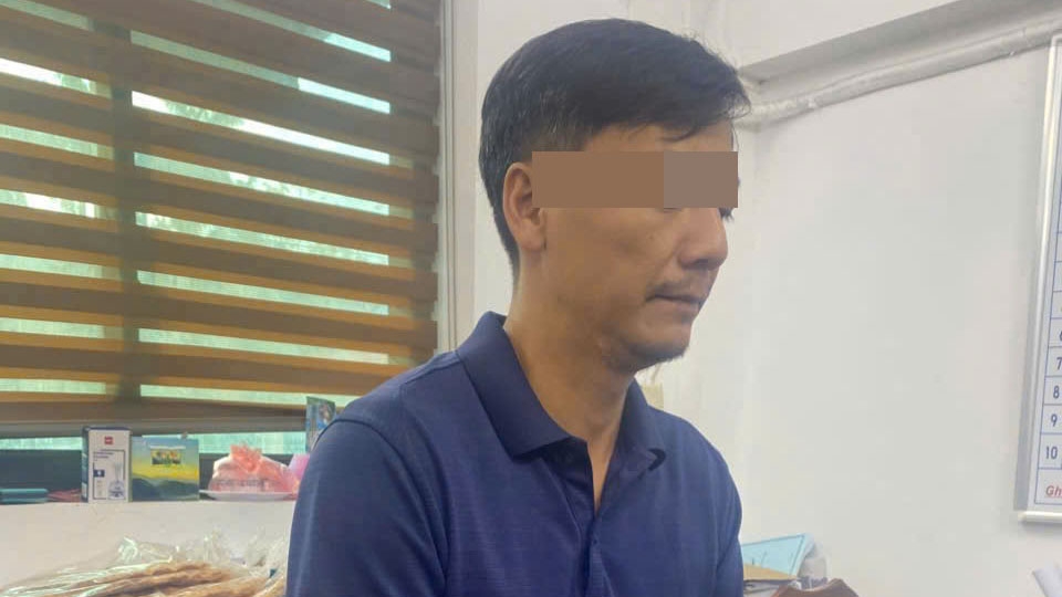 Trần Văn Huân tại cơ quan Công an