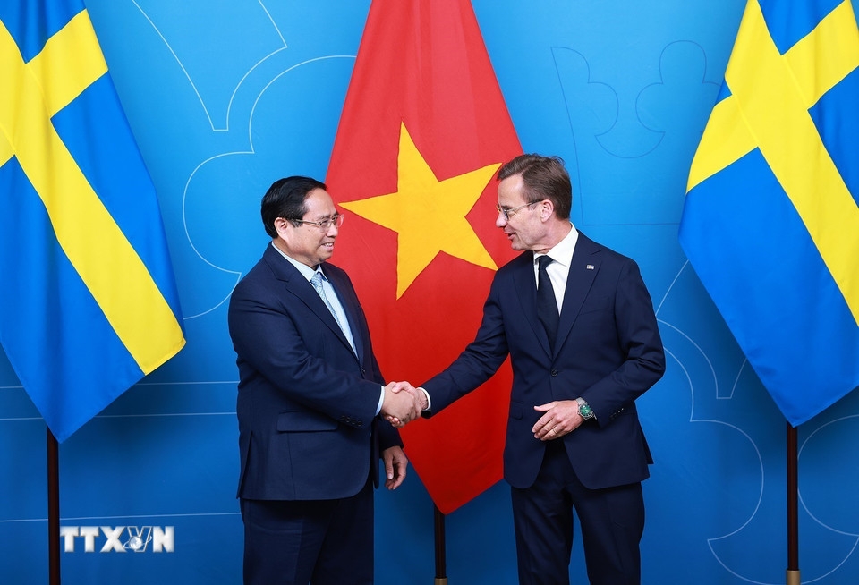 Thủ tướng Phạm Minh Chính Hội và Thủ tướng Thụy Điển Ulf Kristerson. (Ảnh: TTXVN)