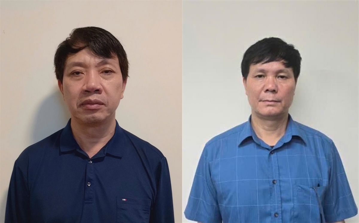 Ông Lê Đức Giang (trái) và ông Phạm Văn Hoành tại cơ quan công an. (Ảnh: Công an cung cấp)